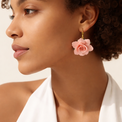 Close-up of romantic pink botanical flower earrings, hand-crafted from polymer clay, perfect for cottagecore and boho fashion styles created by Enchanted Elegance Jewelry.