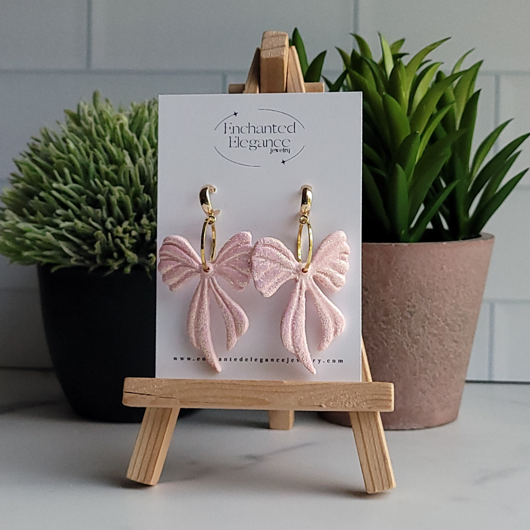 Dangling Bow Awareness Earrings